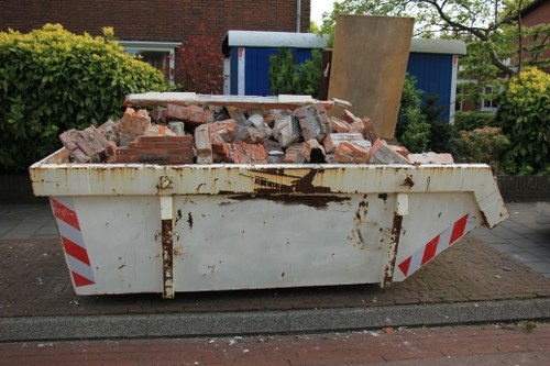 Secure enclosed skip for waste management in Acton