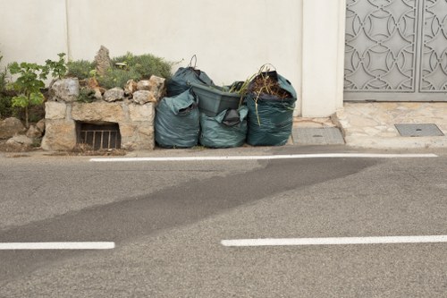 Construction site with waste containers in Acton