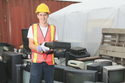 Various types of demolition waste materials separated for recycling
