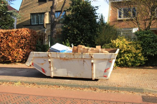 Professional clearing out a living room in Acton